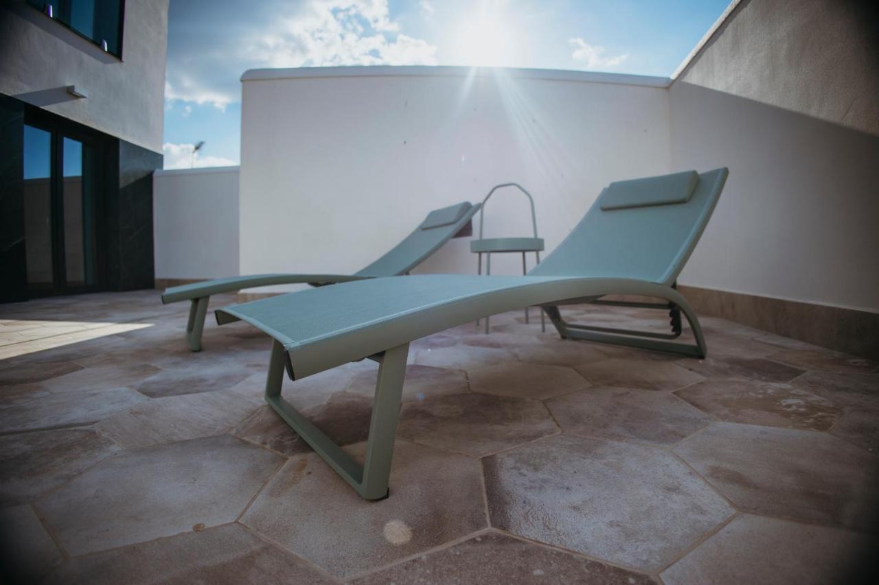 Oikos Apartamentos Turisticos Монестерио Экстерьер фото