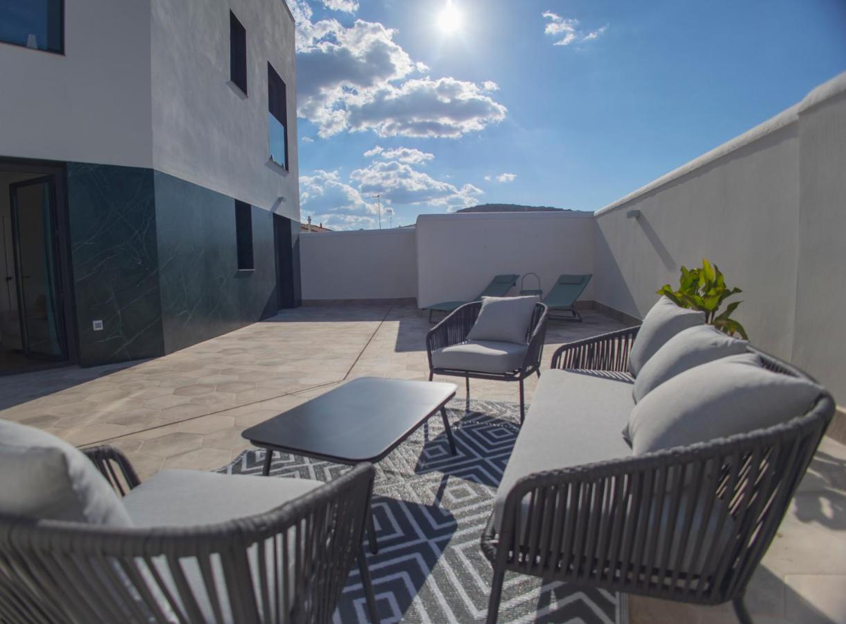 Oikos Apartamentos Turisticos Монестерио Экстерьер фото